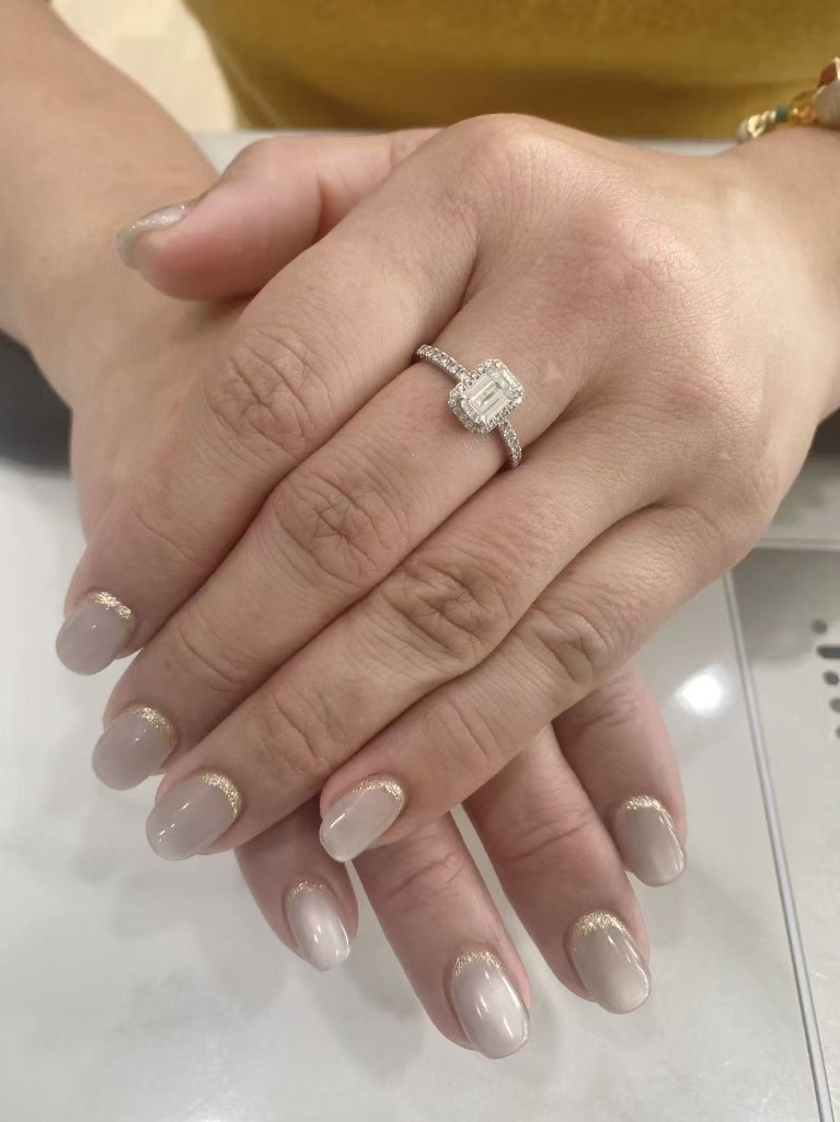 Taupe nails with gold glitter tips