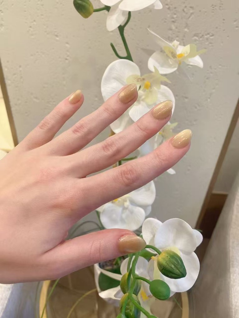 Champagne shimmer nails with orchid
